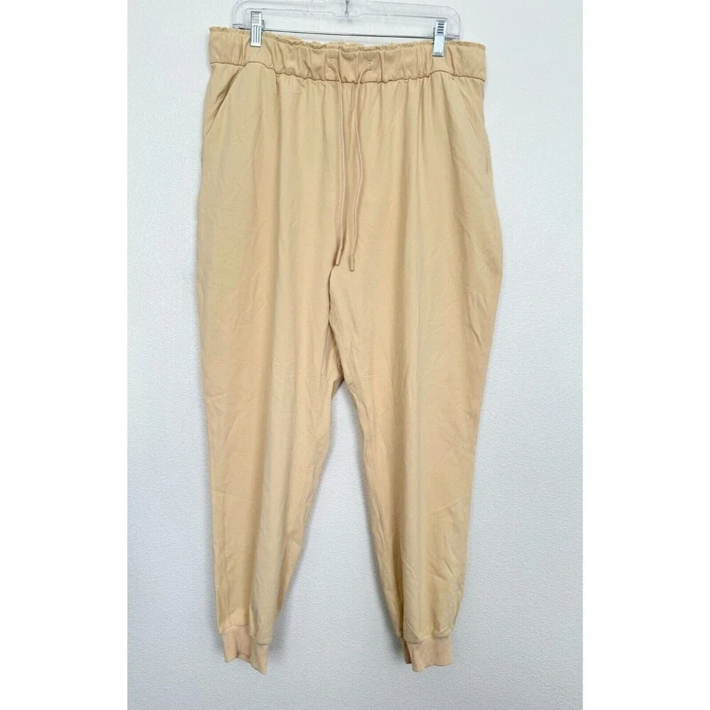 Lululemon Stretch High Rise Jogger in Beige Athleisure Tapered Pocket Women's 14
